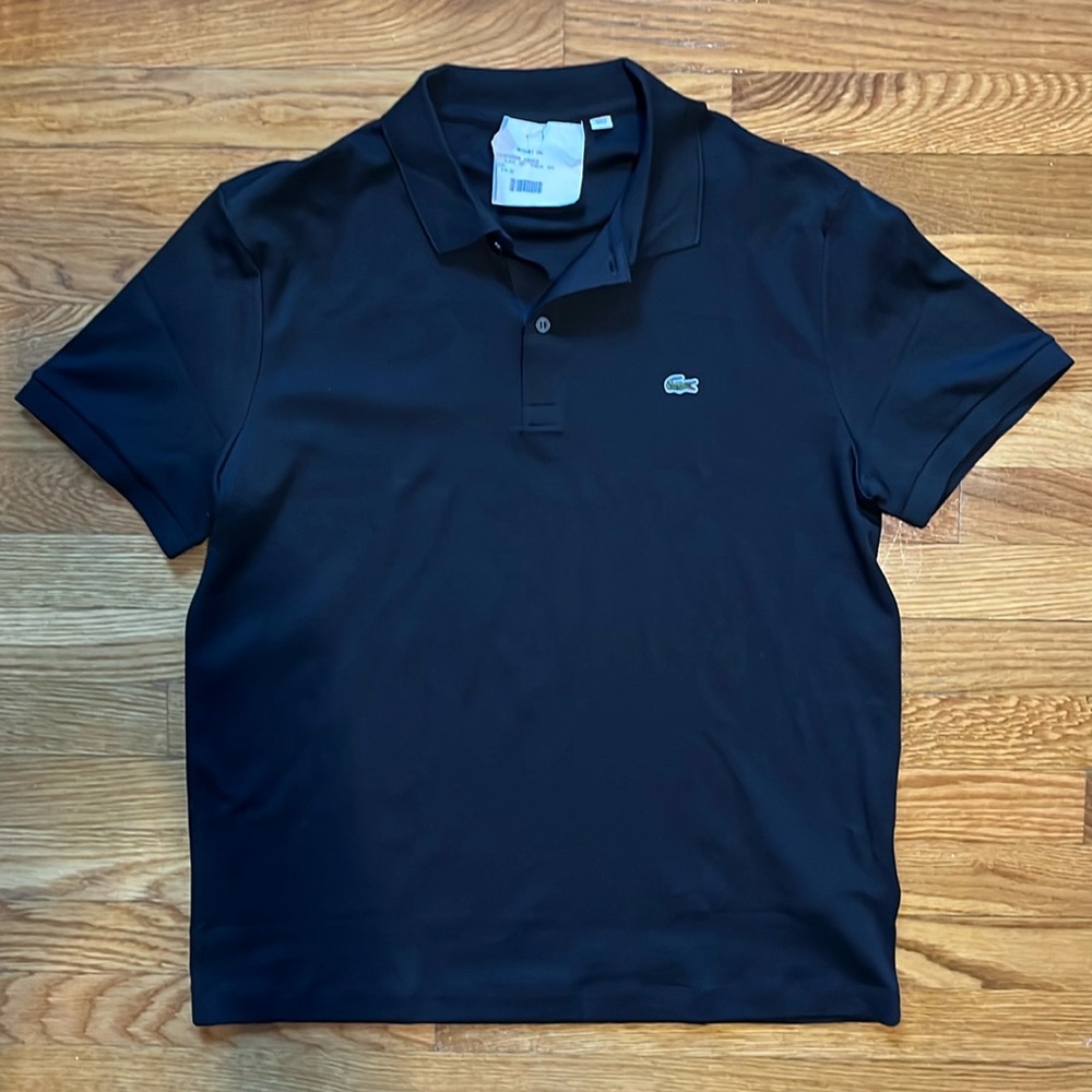 Brand new with tags Lacoste Black Polo Shirt.